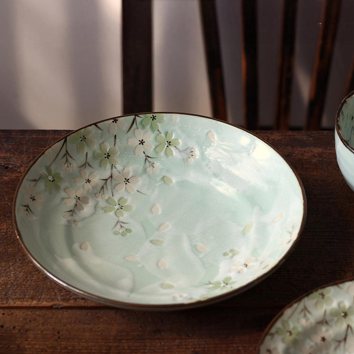 Japanese dinner table setting featuring Mino Ware plates.