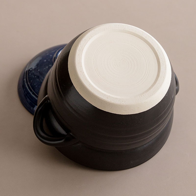 Durable ceramic clay pot base with a smooth finish.