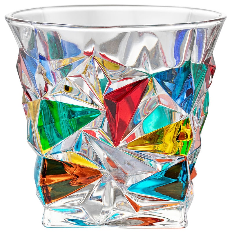 Italian mosaic glassware with colorful reflections on a white background