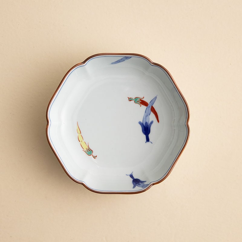 Vibrant porcelain plates showcasing traditional Japanese designs