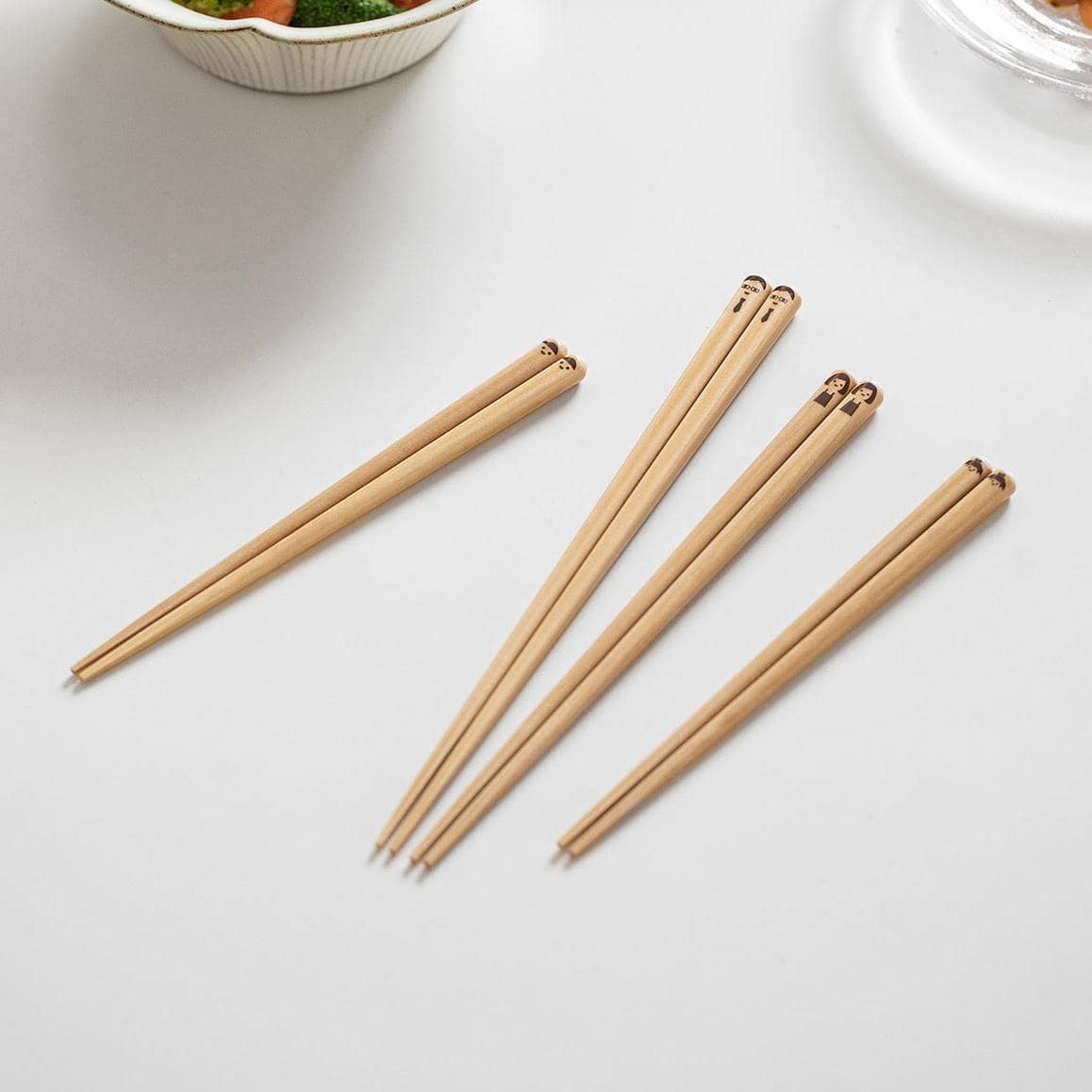 Set of eco-friendly bamboo chopsticks for family dining.