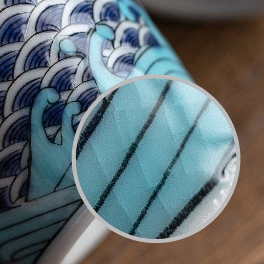 Set of Japanese porcelain cups with vibrant patterns