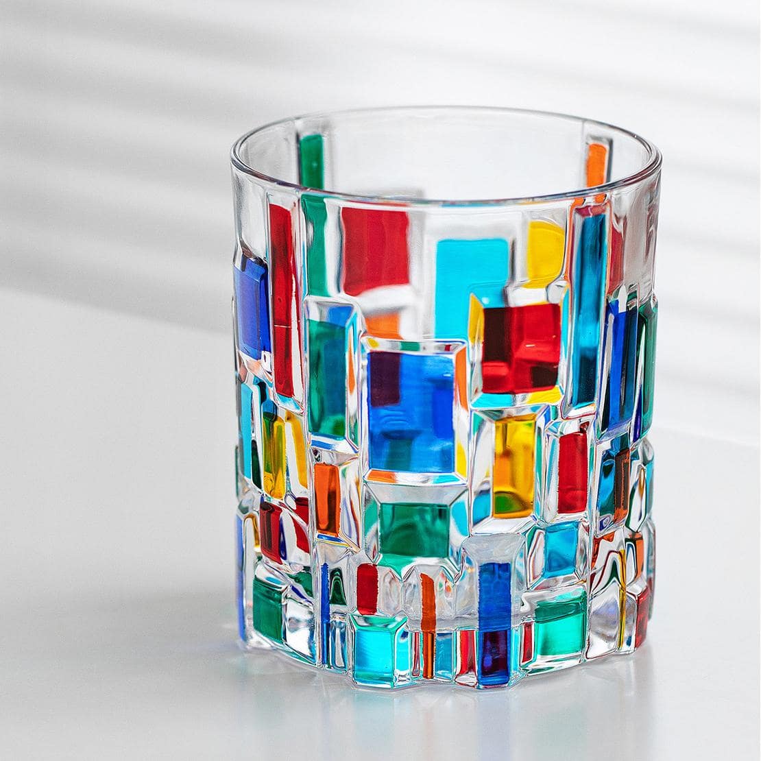 Top view of Murano mosaic glass reflecting colorful light