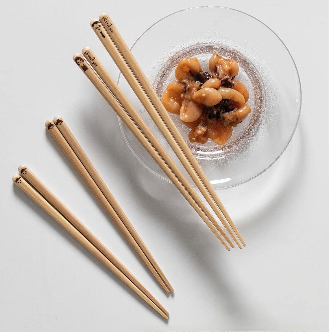 Set of eco-friendly bamboo chopsticks for family dining.