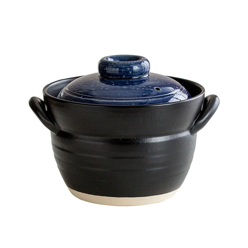 Compact Japanese-style cooking pot for rice and soup preparation.