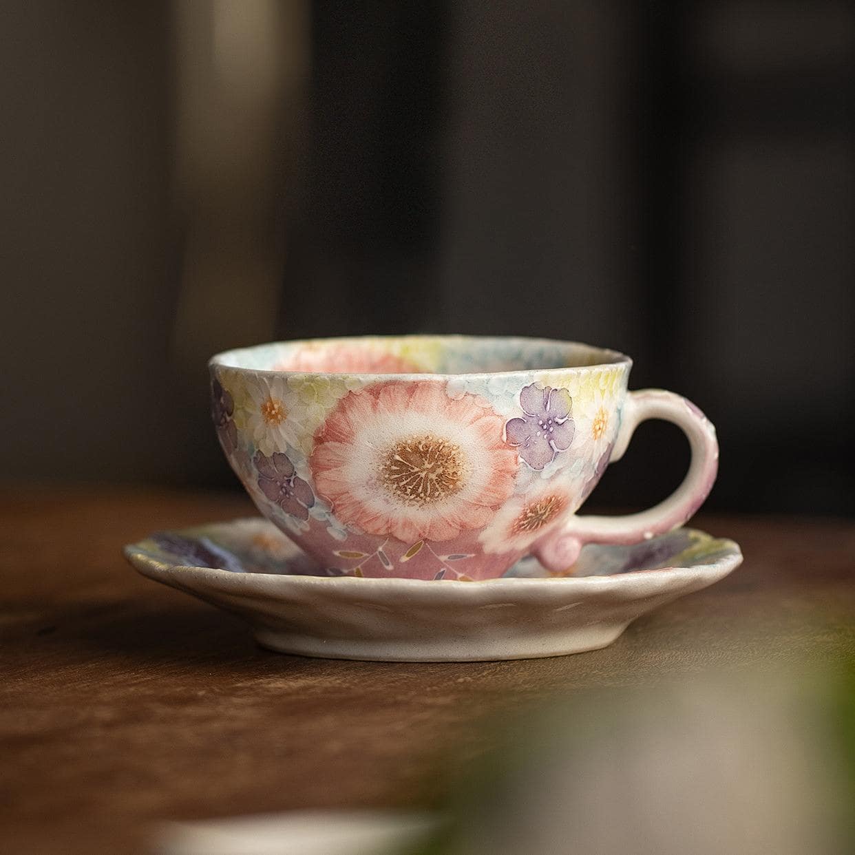 Delicate Japanese tea cup featuring a unique floral design