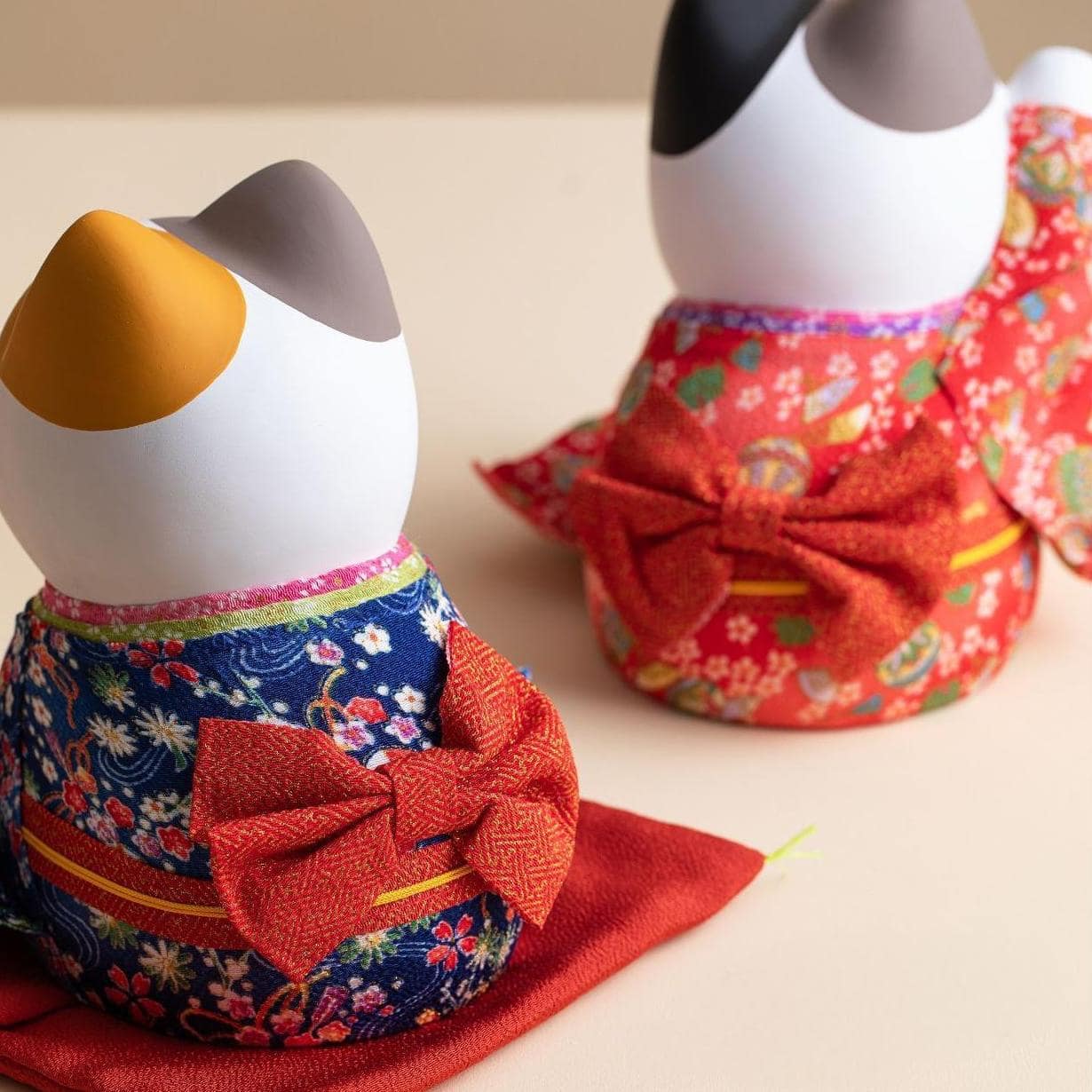 Japanese-style lucky cat with raised paw for good fortune