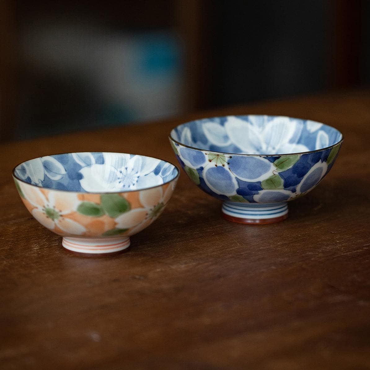 Peach and green floral ceramic bowl close-up