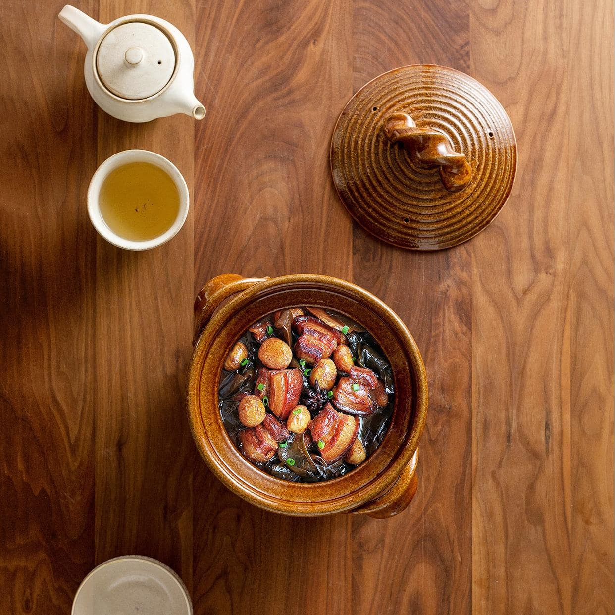 Authentic Japanese soup pot with knot-style lid and ergonomic handles