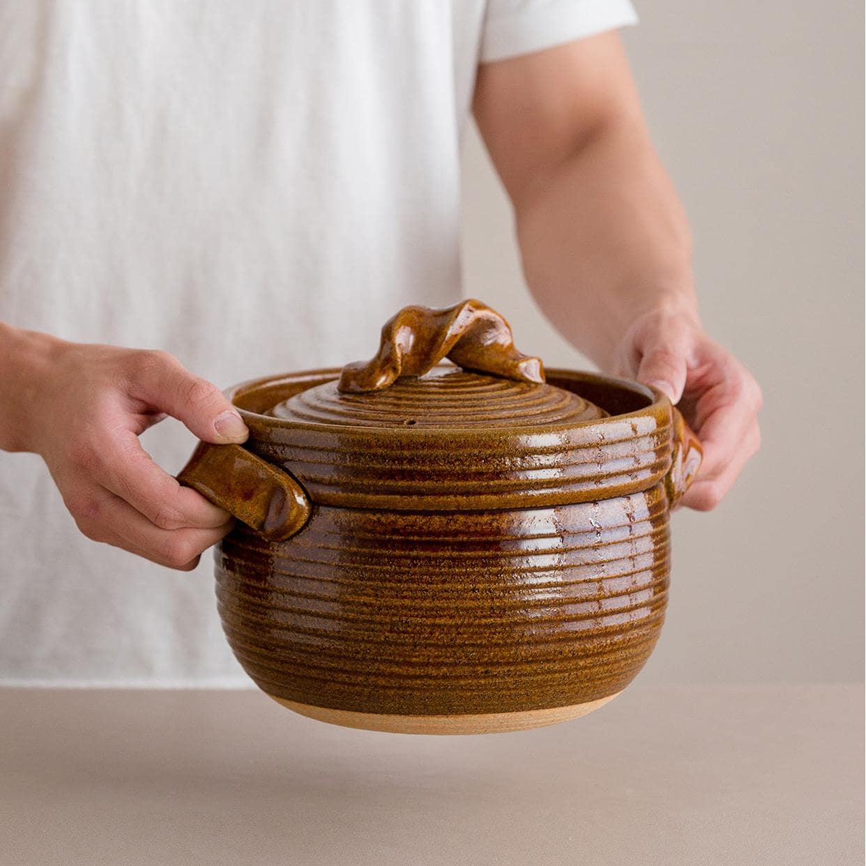 Close-up of traditional Shinraku-yaki stew pot with textured finish