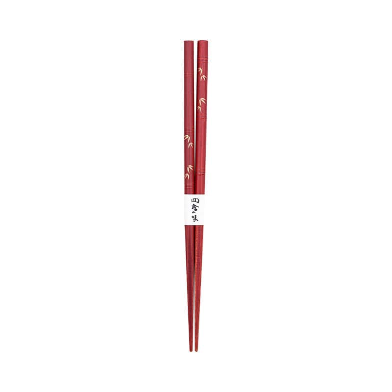 Pair of red lacquer-coated chopsticks with engraved bamboo design.