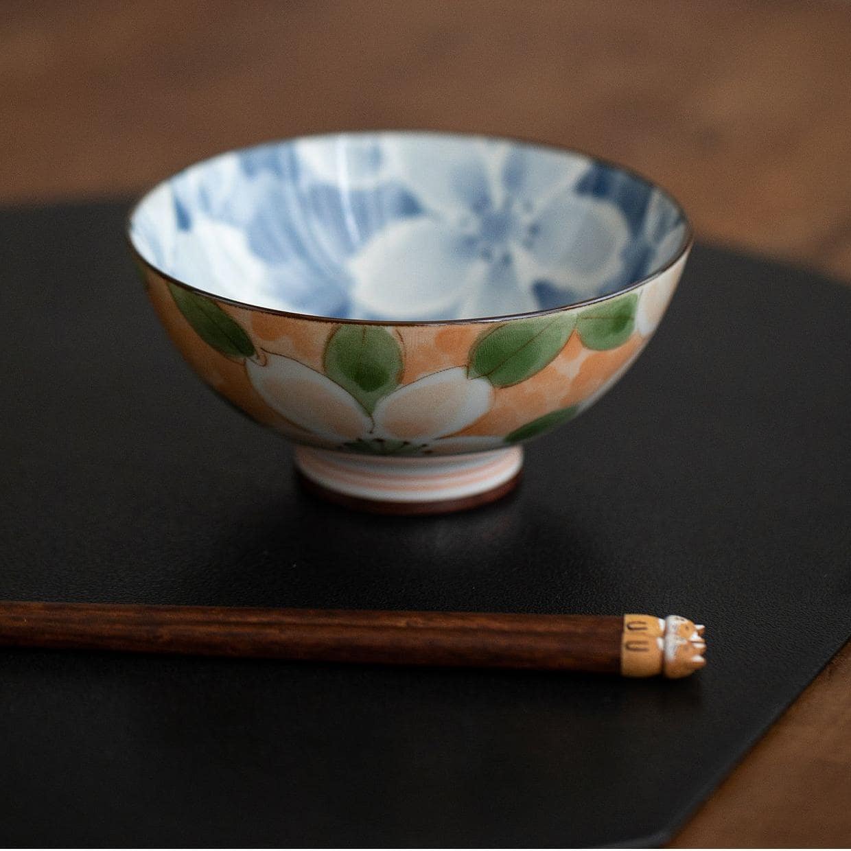 Overhead view of floral ceramic bowls showcasing details