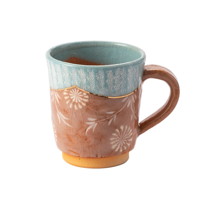 Vintage-inspired ceramic mug with ergonomic handle and crackle glaze