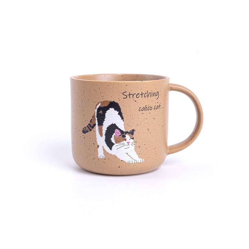 Pair of handcrafted mugs with charming cat-inspired illustrations.