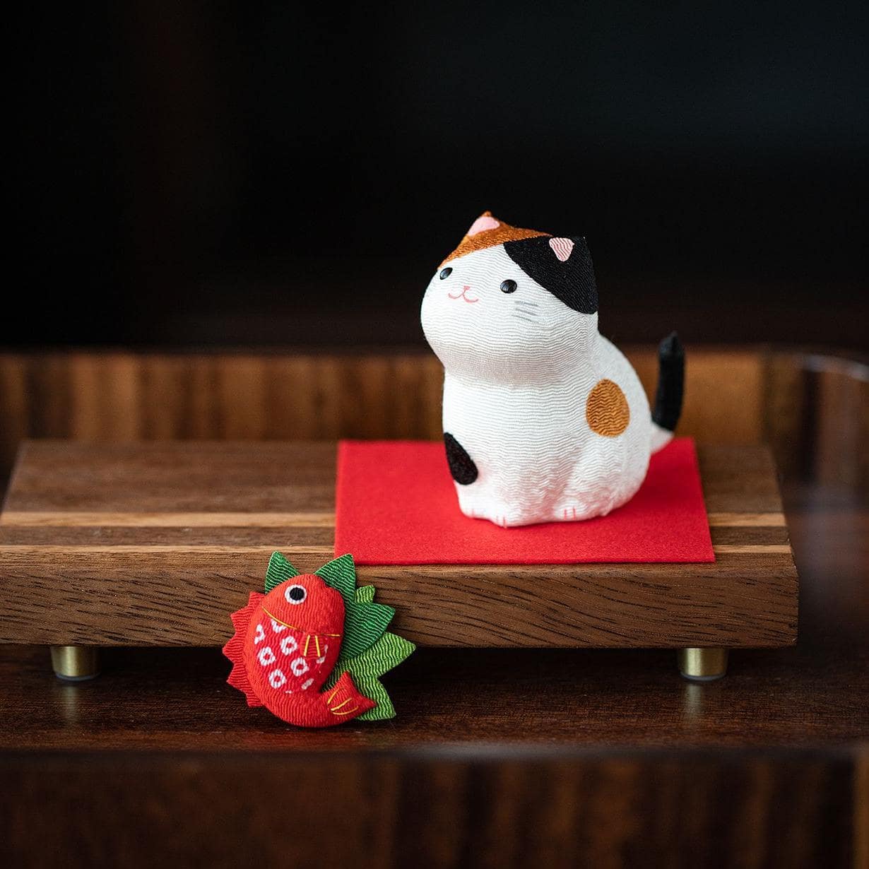 Japanese handcrafted fortune cat ornament on desk