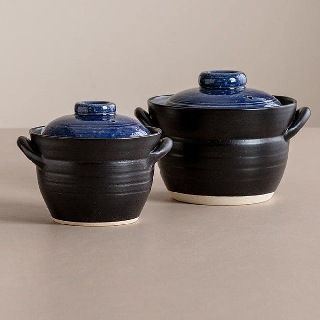 Japanese double-lid clay pot with black and blue glaze design.