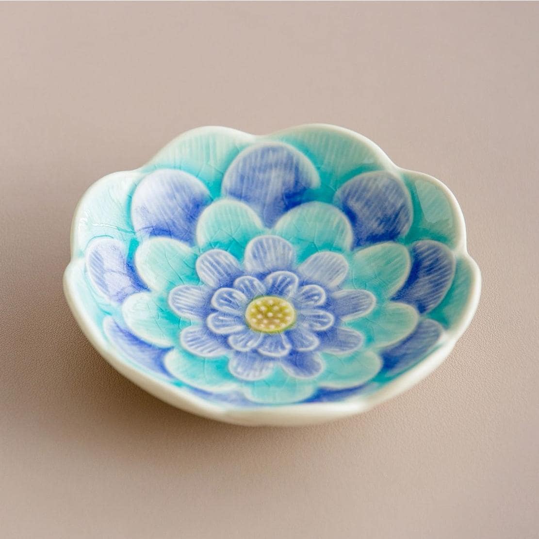 Delicate Japanese flower snack dish paired with tea