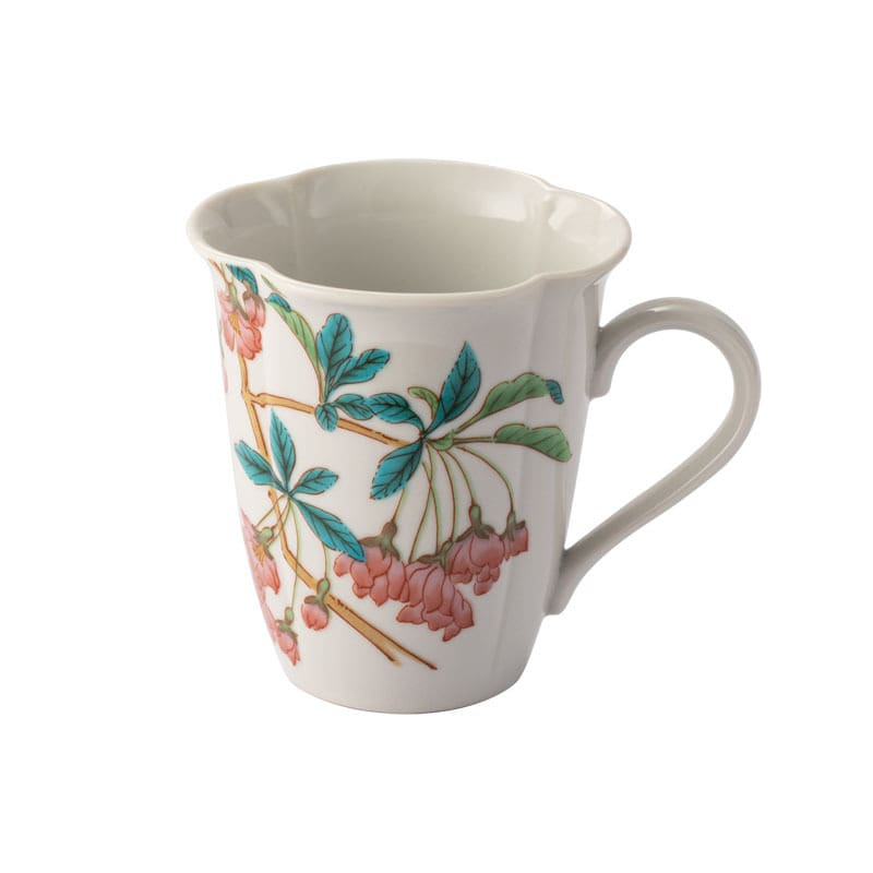 Artistic collection of floral ceramic mugs on display