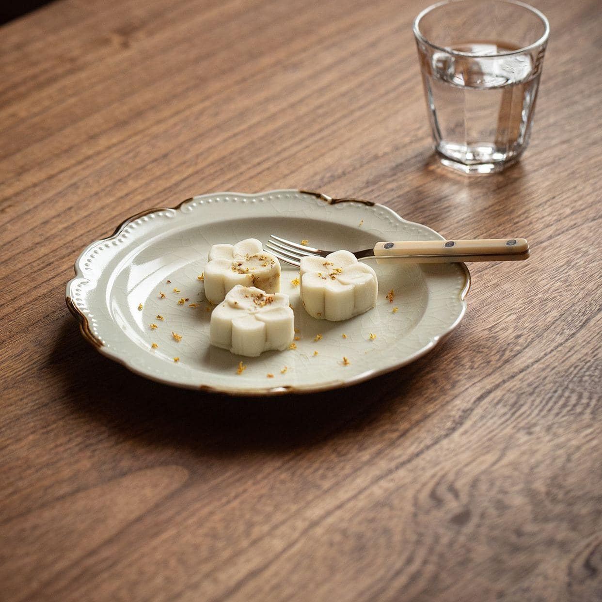 Artistic ceramic plate featuring elegant wavy edges.