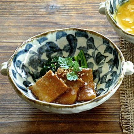 Double-ear Japanese pottery bowls showcasing elegant dining