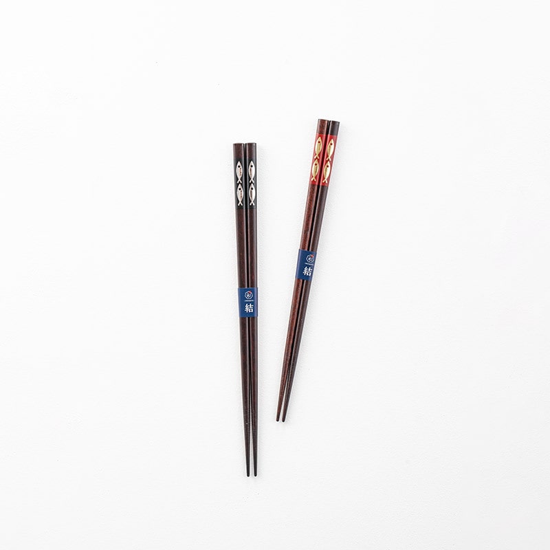 Handcrafted wooden chopsticks with fish motif in black and red designs