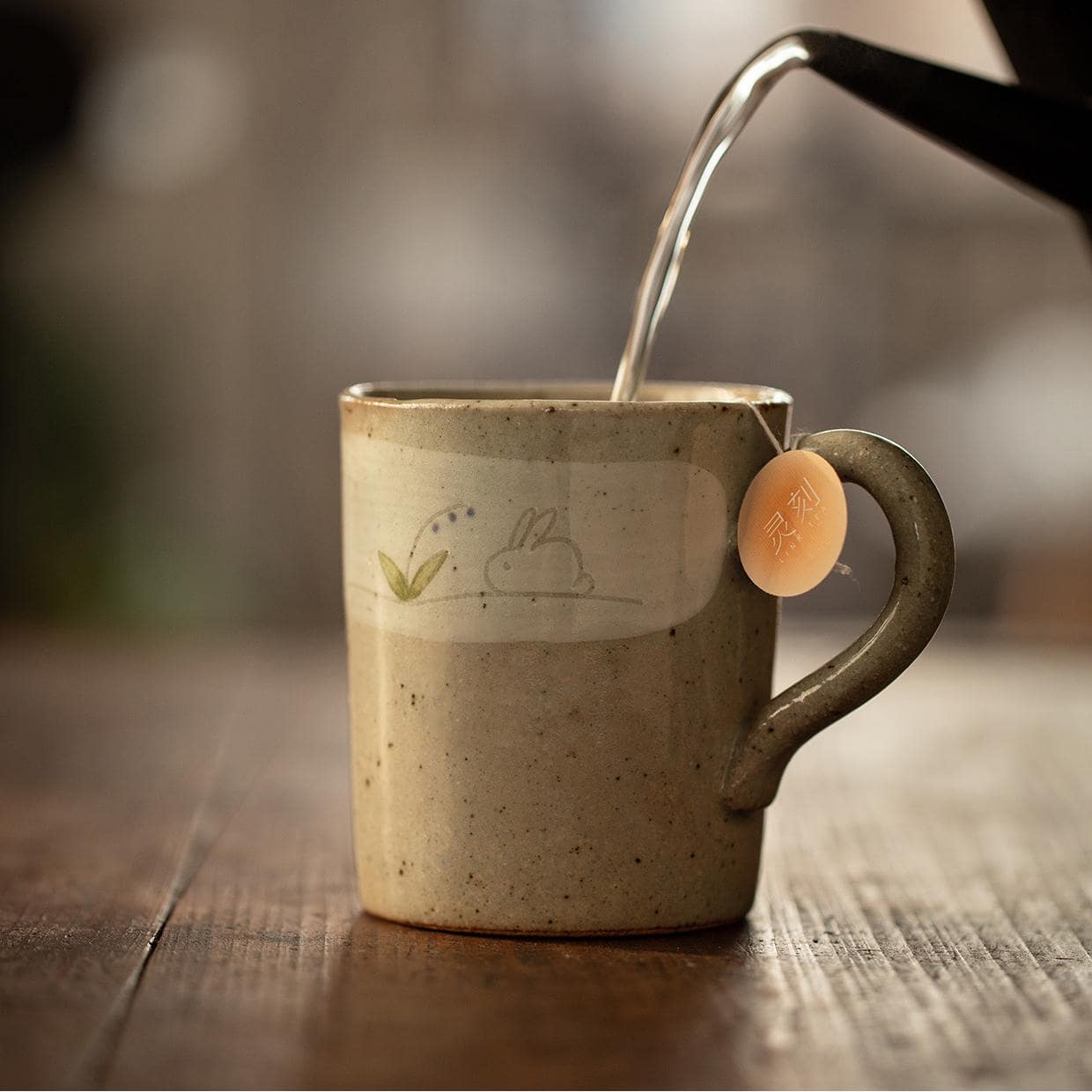 Close-up of Japanese Wan Gu Yao rabbit ceramic mug.