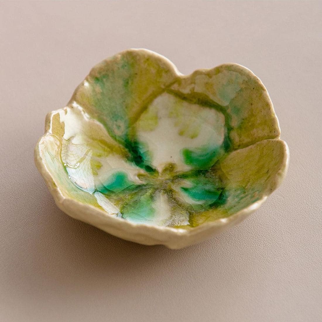 Handcrafted Japanese flower-shaped ceramic dish with ice crack glaze