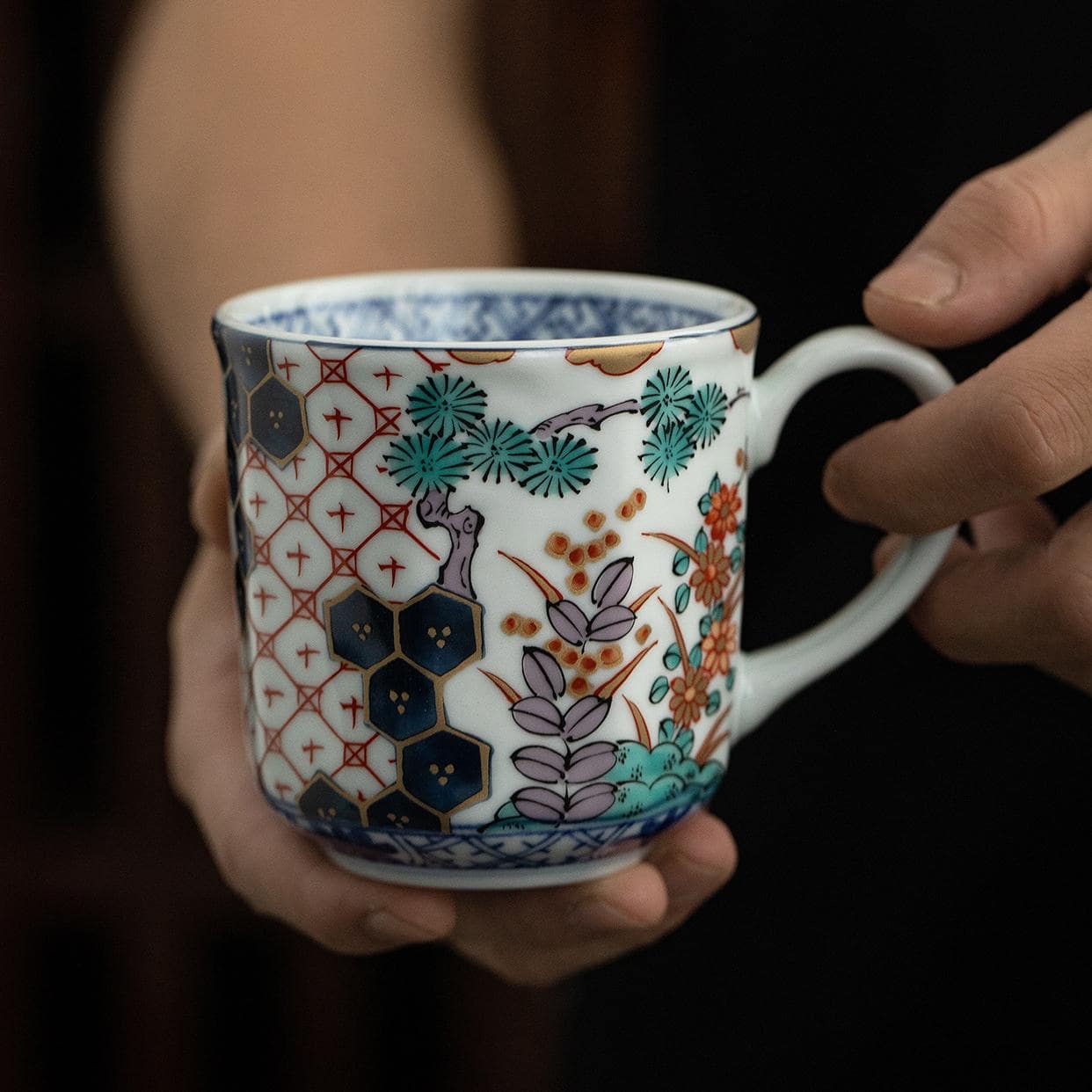 Elegant Japanese porcelain teacup with intricate pattern