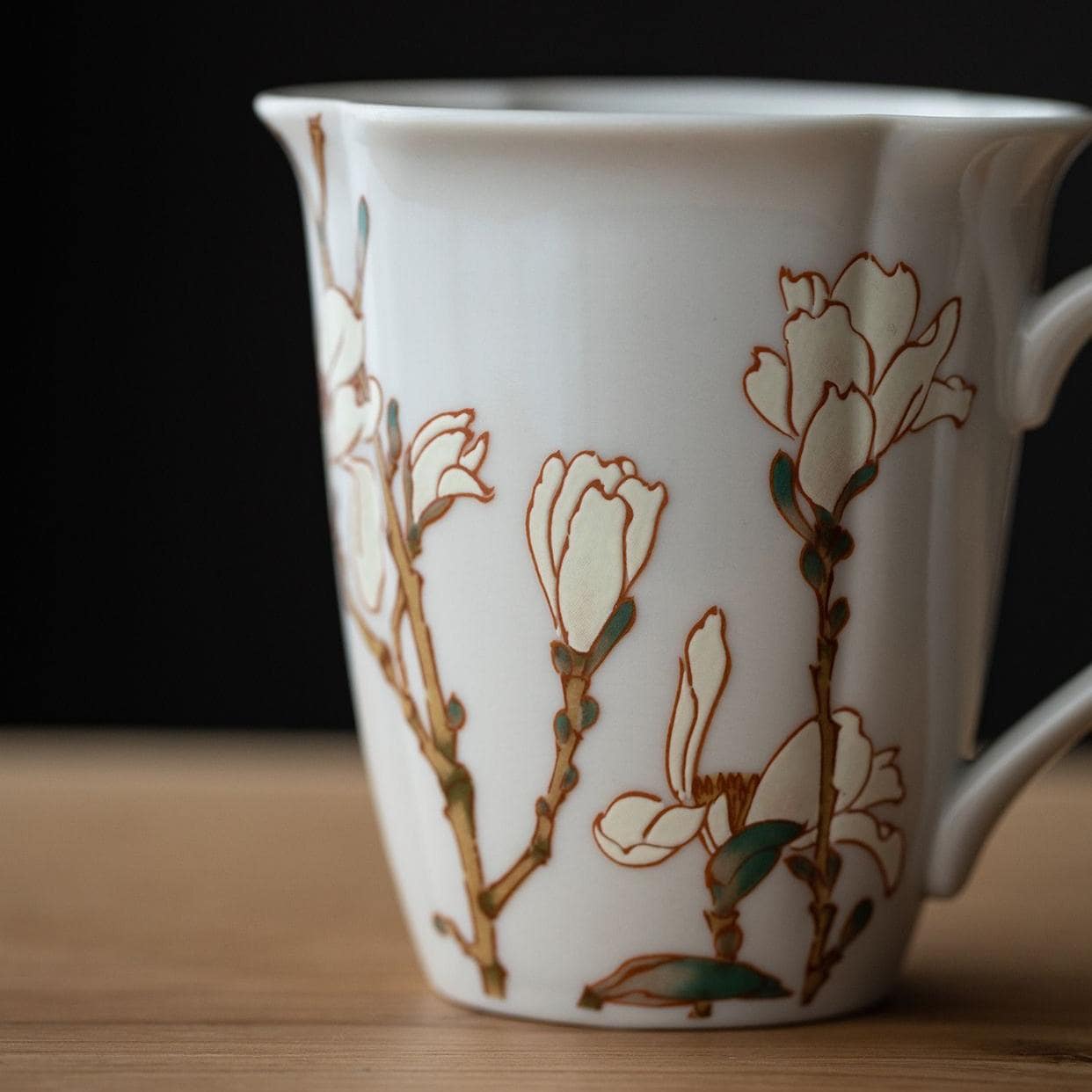 Close-up of floral design on a premium ceramic mug