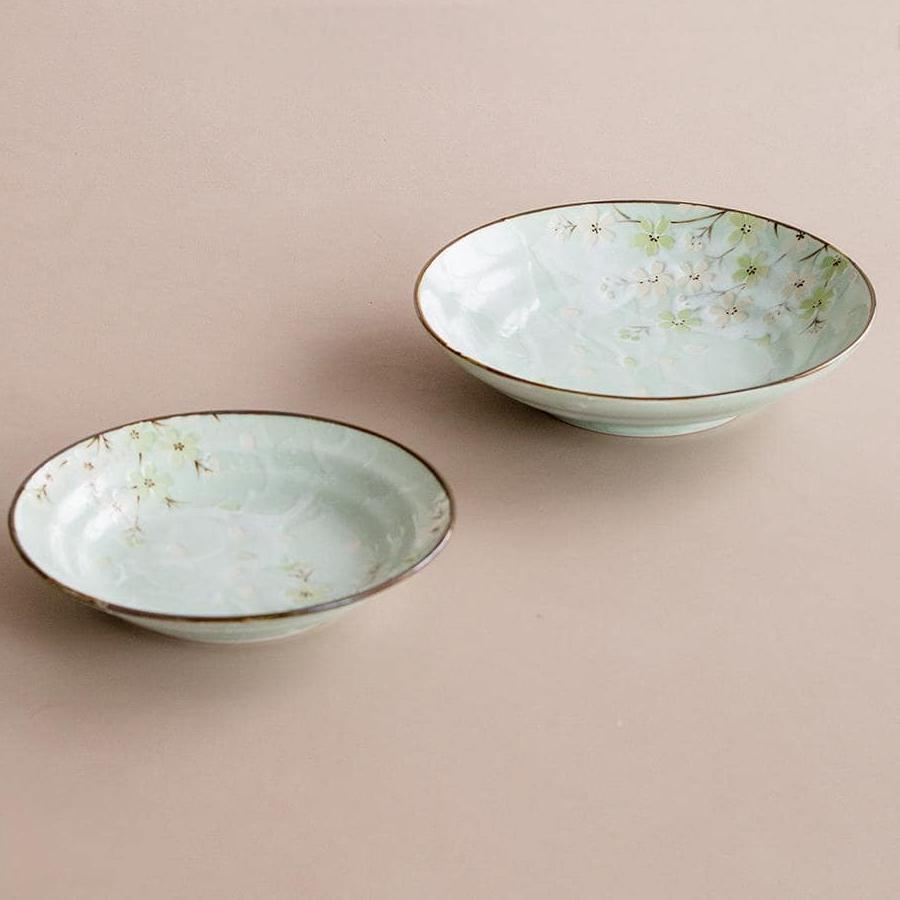 Pair of Japanese Mino Ware Autumn Cherry deep plates on beige.