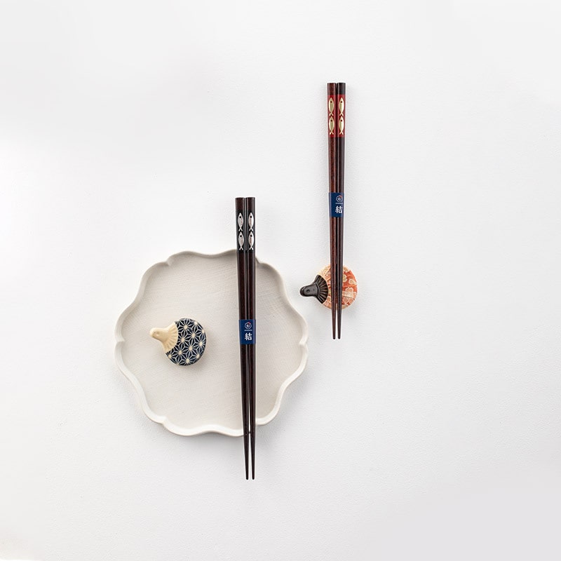 Pair of traditional wooden chopsticks with ergonomic design