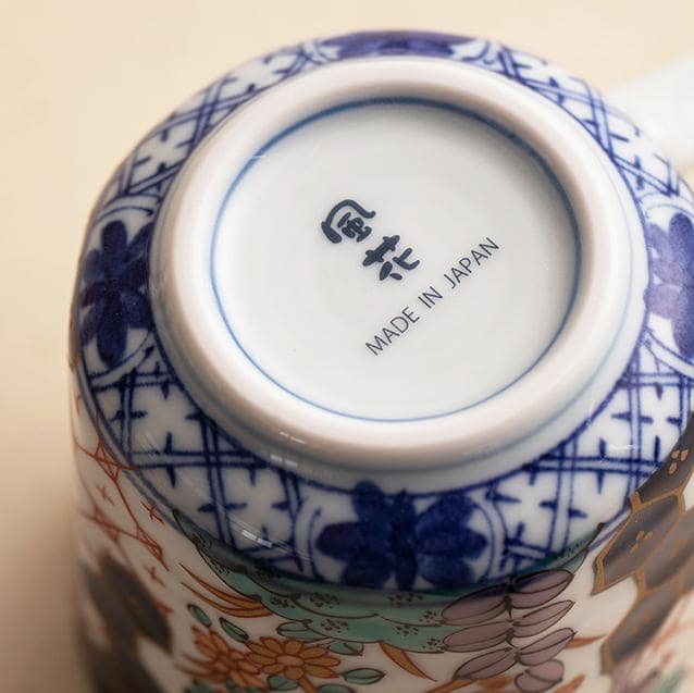 Decorative porcelain tea set with floral and geometric patterns