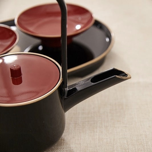 High-quality Japanese tea set with decorative details.