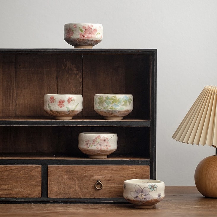 Japanese ceramic tea cup set showcasing artisanal craftsmanship.