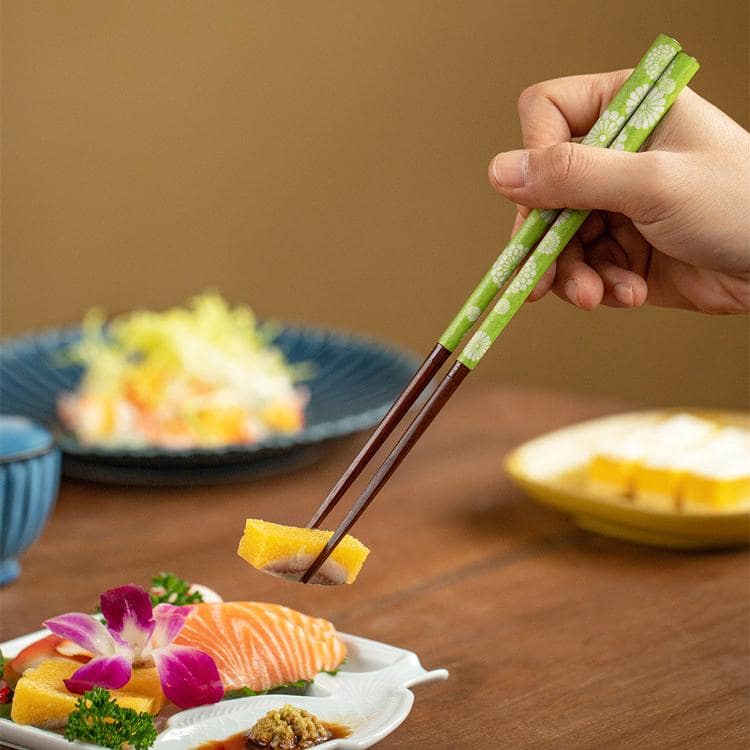 Matching couple chopsticks featuring cherry blossom patterns