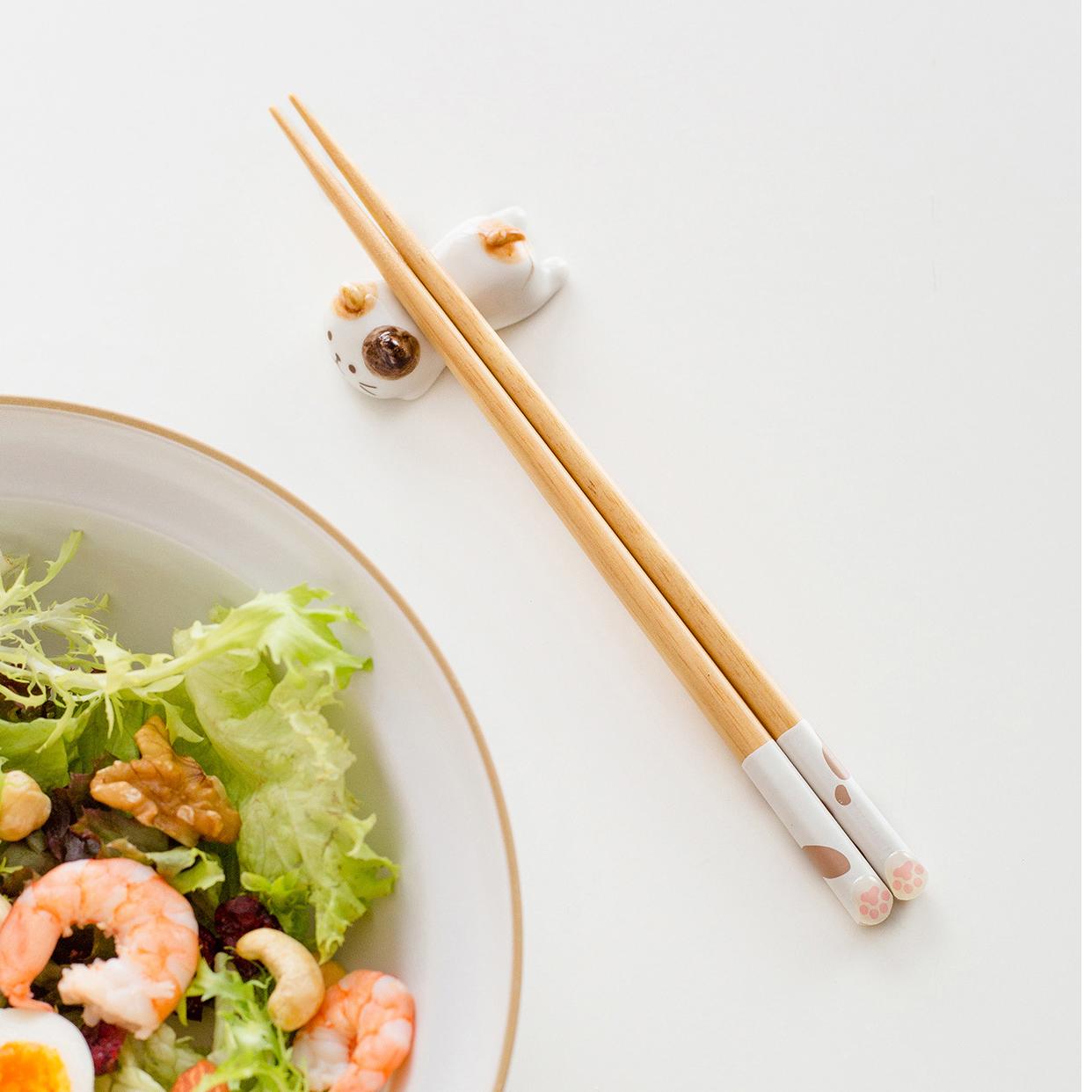 Adorable cat paw wooden chopsticks in white, black, and orange