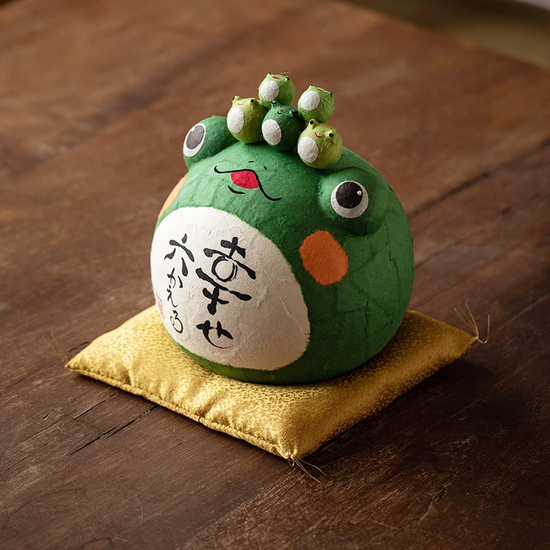 Adorable travel peace frog figurine with hand-painted details.