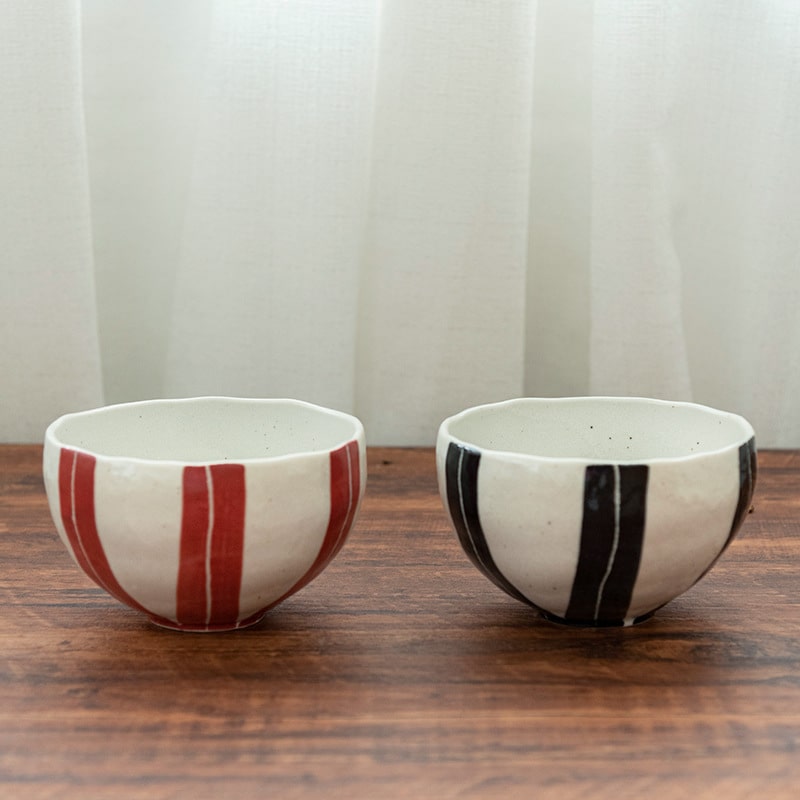 Red and black striped Japanese ceramic noodle bowls