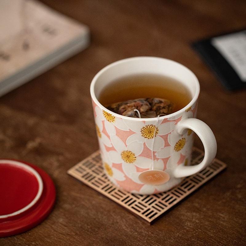 Elegant ceramic tea cups with wooden gift box packaging