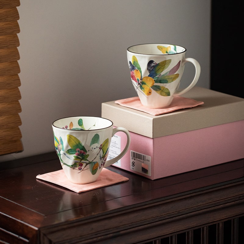 Elegant tea cup set with colorful flower designs