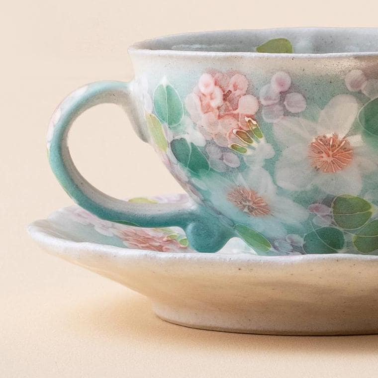 Delicate Japanese tea cup featuring a unique floral design