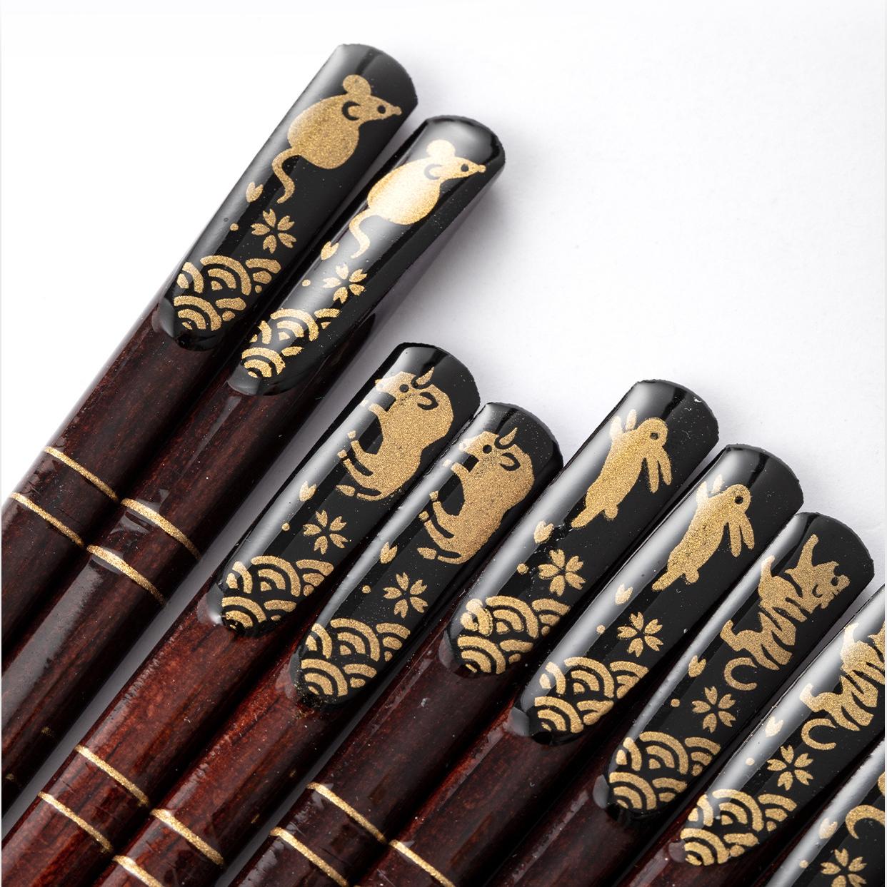 Luxurious Wooden Chopsticks with Intricate Gold Zodiac Animal Motif Designs






