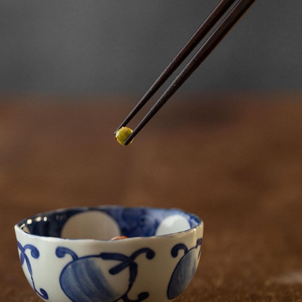 Pair of traditional wooden chopsticks with ergonomic design