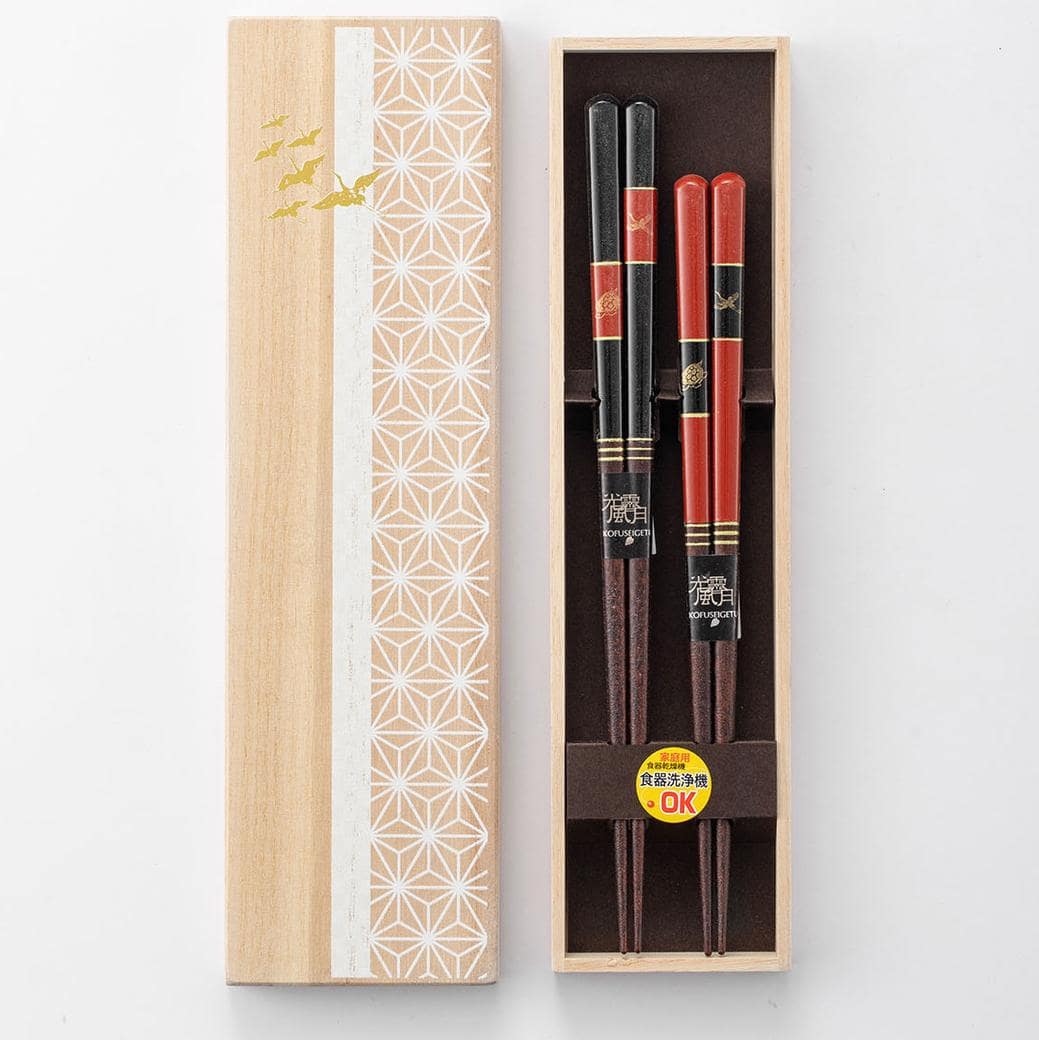 Close-up of Japanese chopsticks set in a decorative wooden box