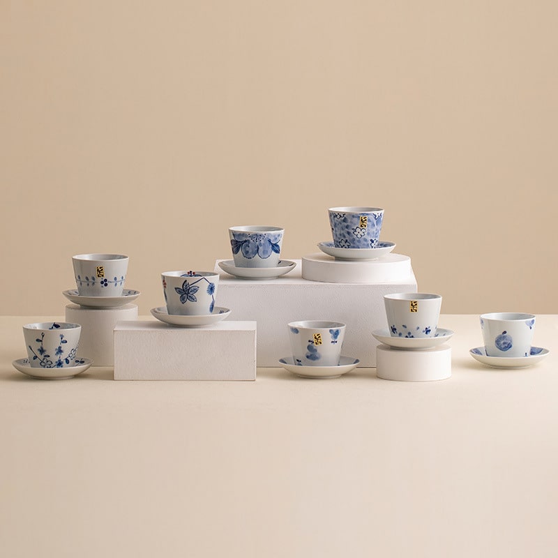 Assorted blue floral porcelain cup and saucer designs