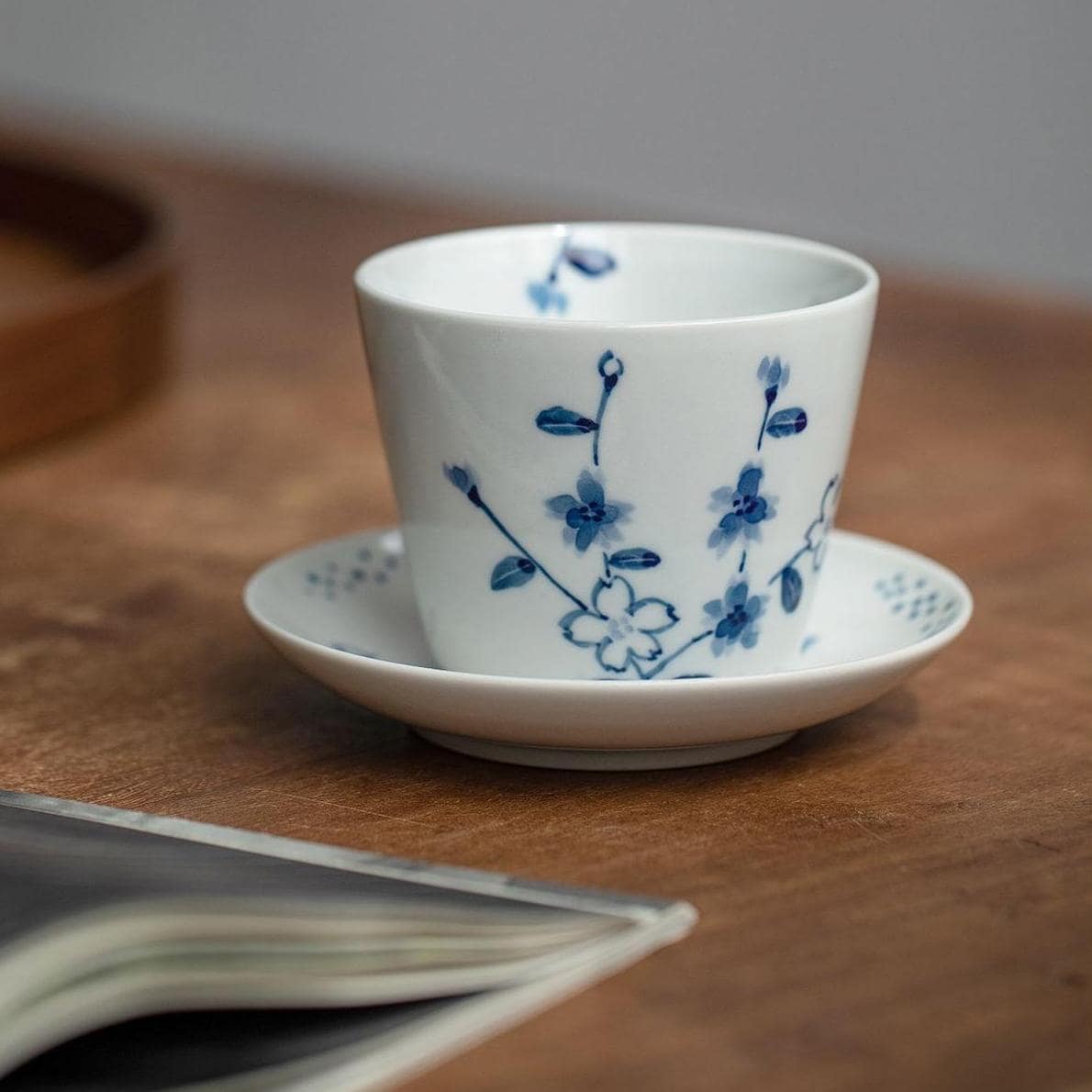 Assorted blue floral porcelain cup and saucer designs