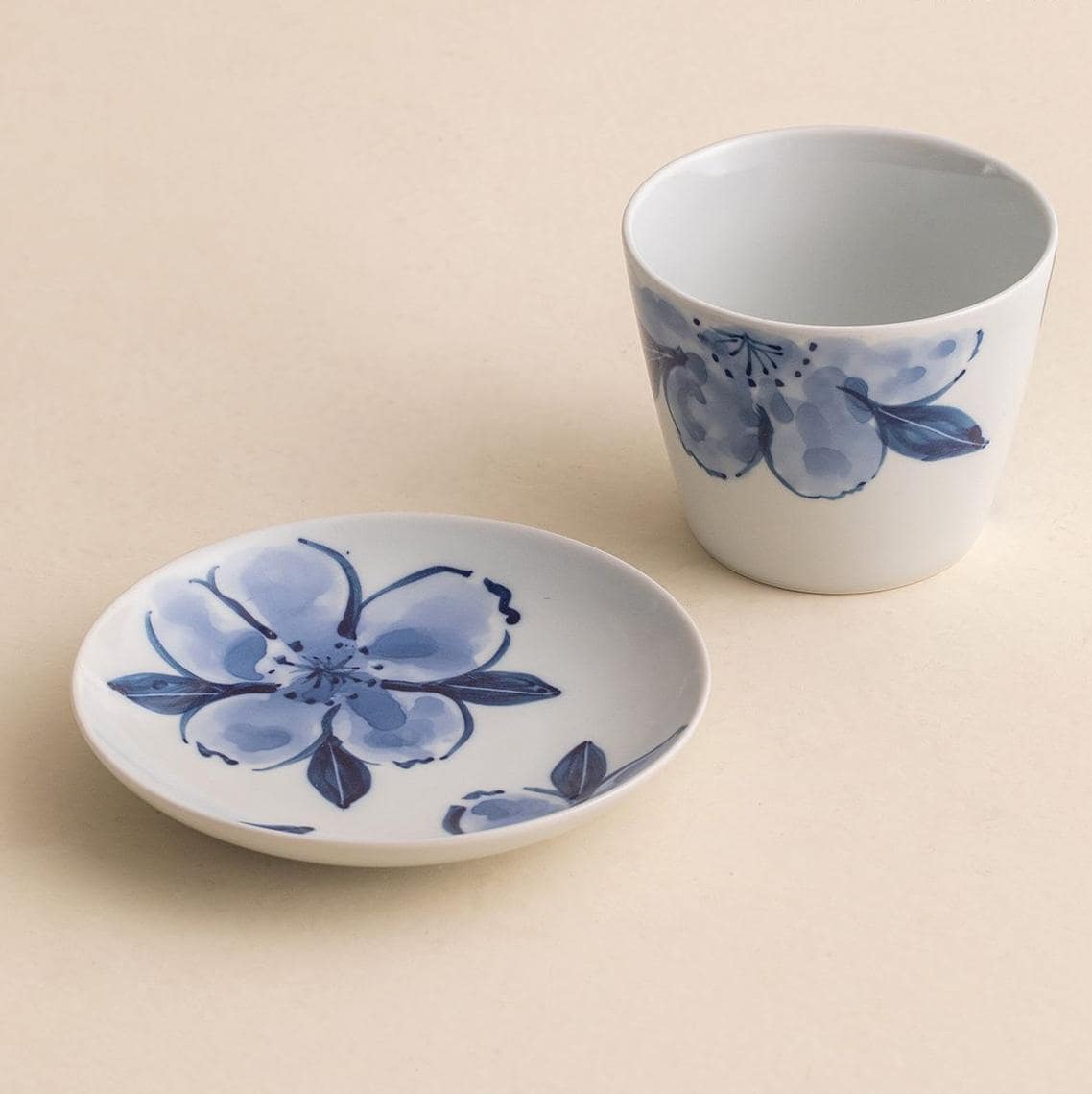 Close-up of blue floral porcelain tea cup and saucer