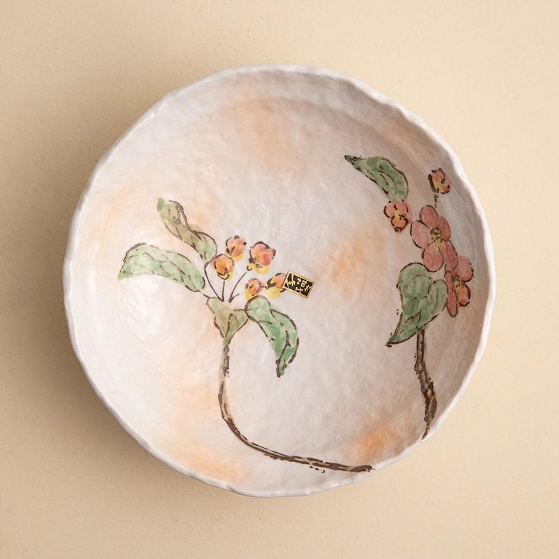 Unique hand-painted bowl showcasing intricate flower designs