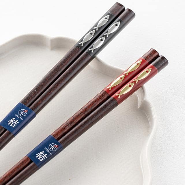 Pair of traditional wooden chopsticks with ergonomic design