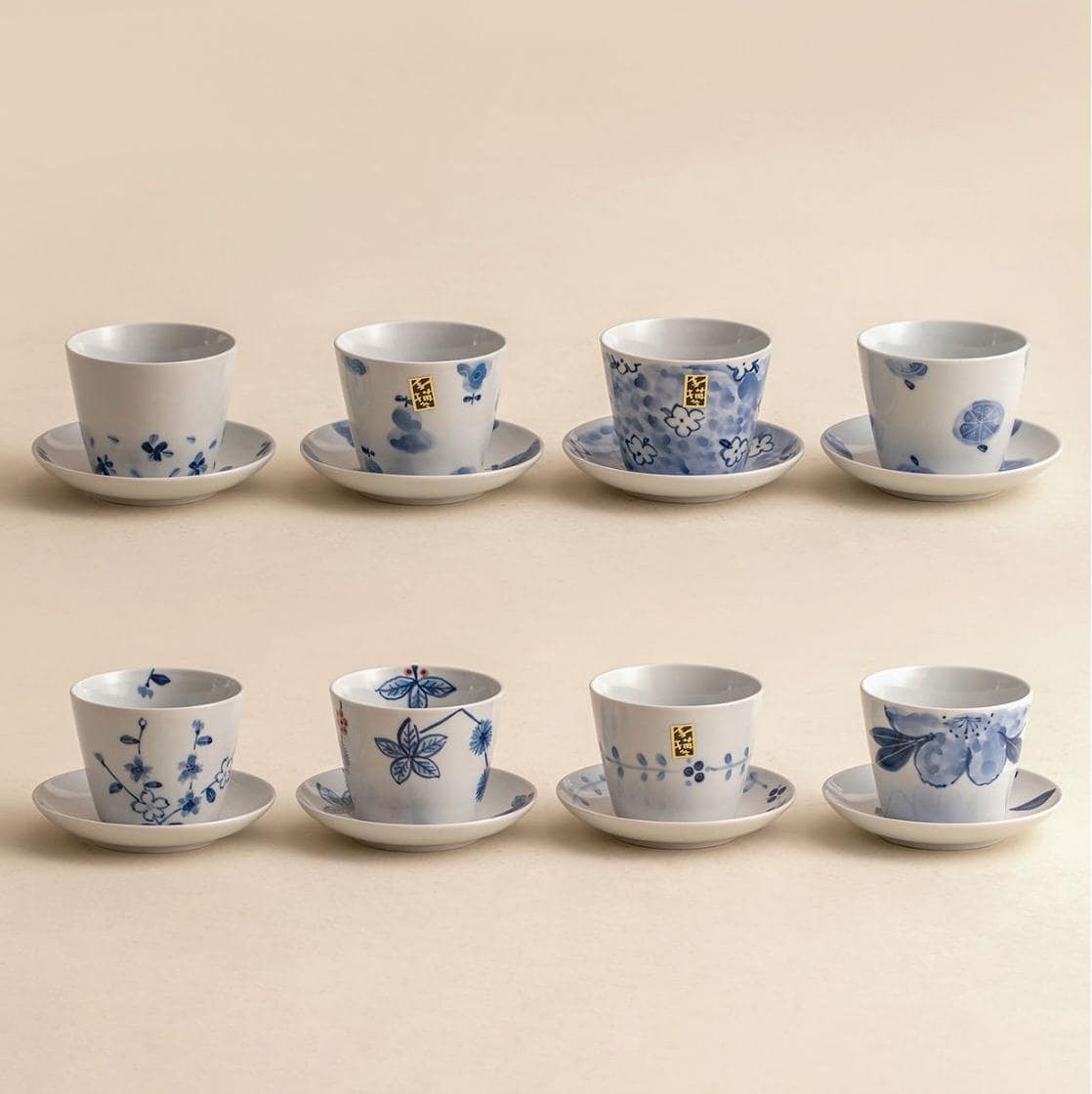 Assorted blue floral porcelain cup and saucer designs